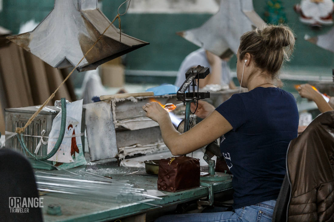A glassblower at work at the factory