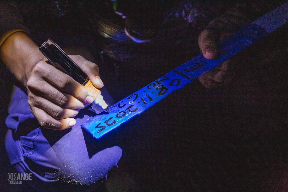 A rager filling out a marker for the turtle egg incubator on Seligan Island