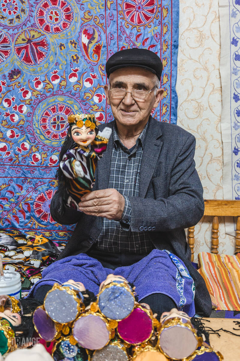 Puppeteer Rustam Kuyazov in his workshop in Khiva