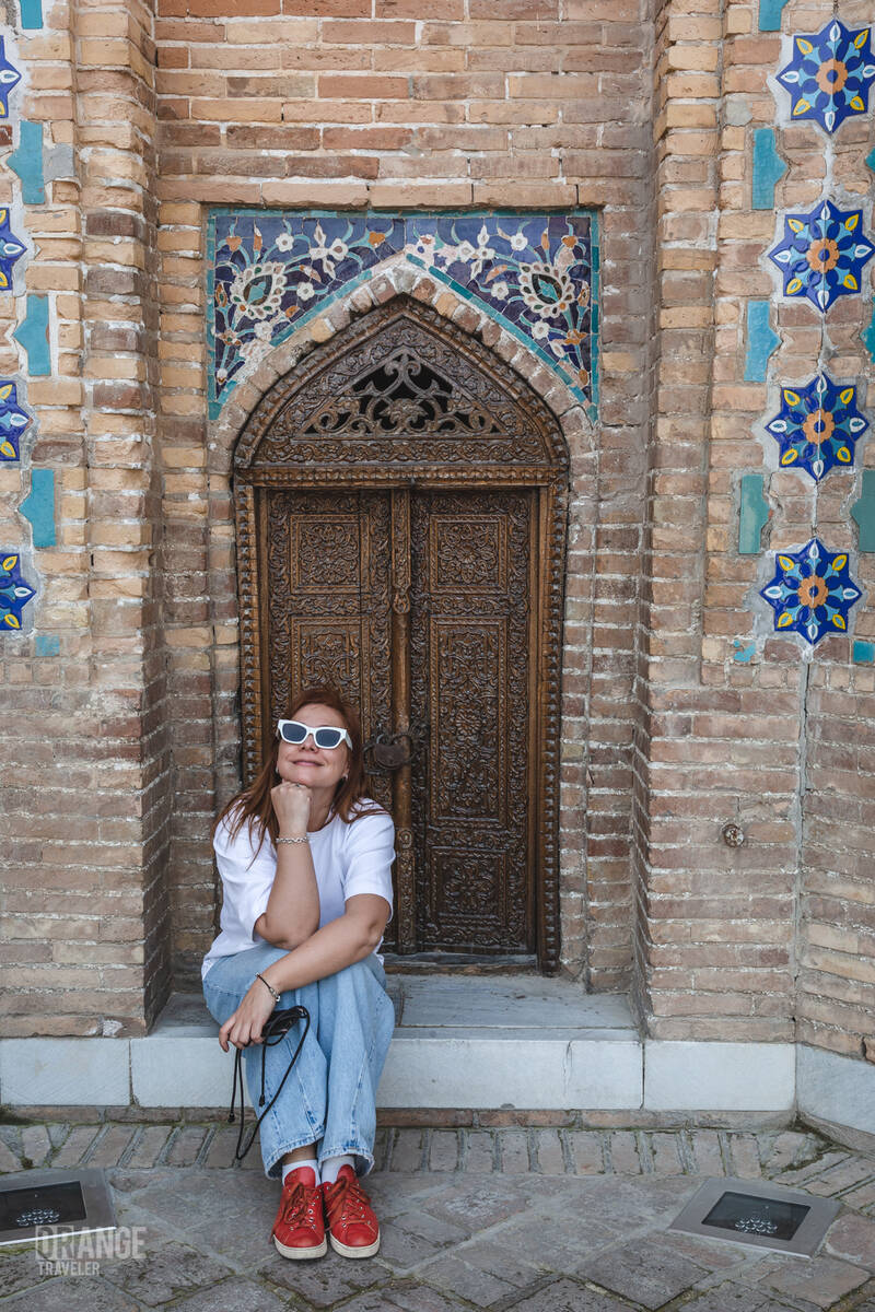 Orange Traveler at the Gur-Emir Mausoleum