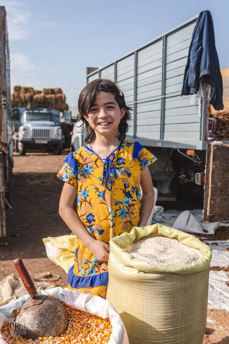 Girl vendor at the market in Urgench, Uzbekistan