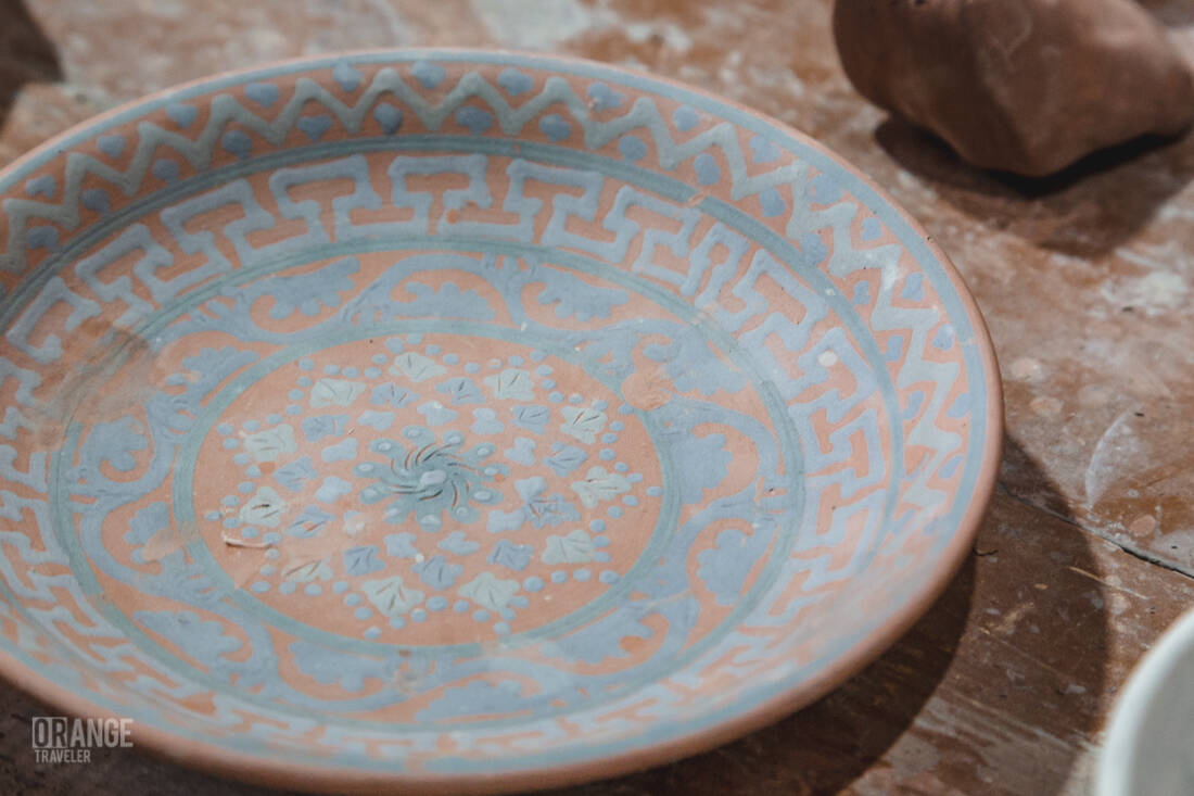 A hand-painted plate at the Narzullaev workshop
